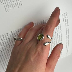 Open ring with yellow-green cubic zirconia
