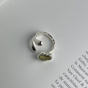 Open ring with yellow-green cubic zirconia
